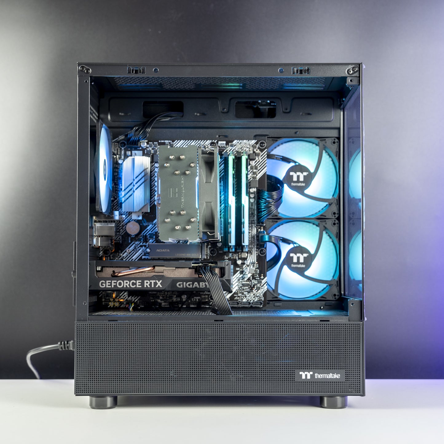 Black AMD custom gaming PC with RGB lighting – Ryzen 5 5600 with NVIDIA RTX 4060 8GB, 32GB DDR4, 1TB SSD in Thermaltake View 170 case, perfect for smooth 1080p and 1440p gaming in Australia