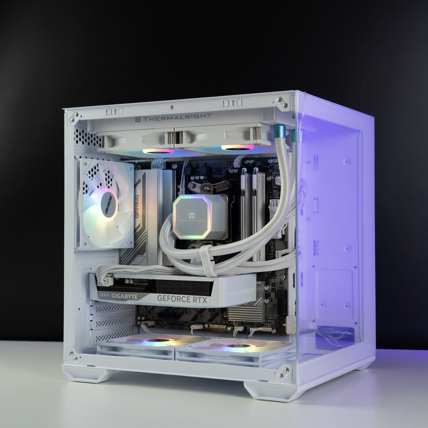 White AMD custom gaming PC with RGB lighting – Ryzen 5 7500F with NVIDIA RTX 5060 8GB, 32GB DDR5, 1TB SSD in Okinos Mirage 4 case, designed for smooth 1080p and 1440p gaming in Australia.