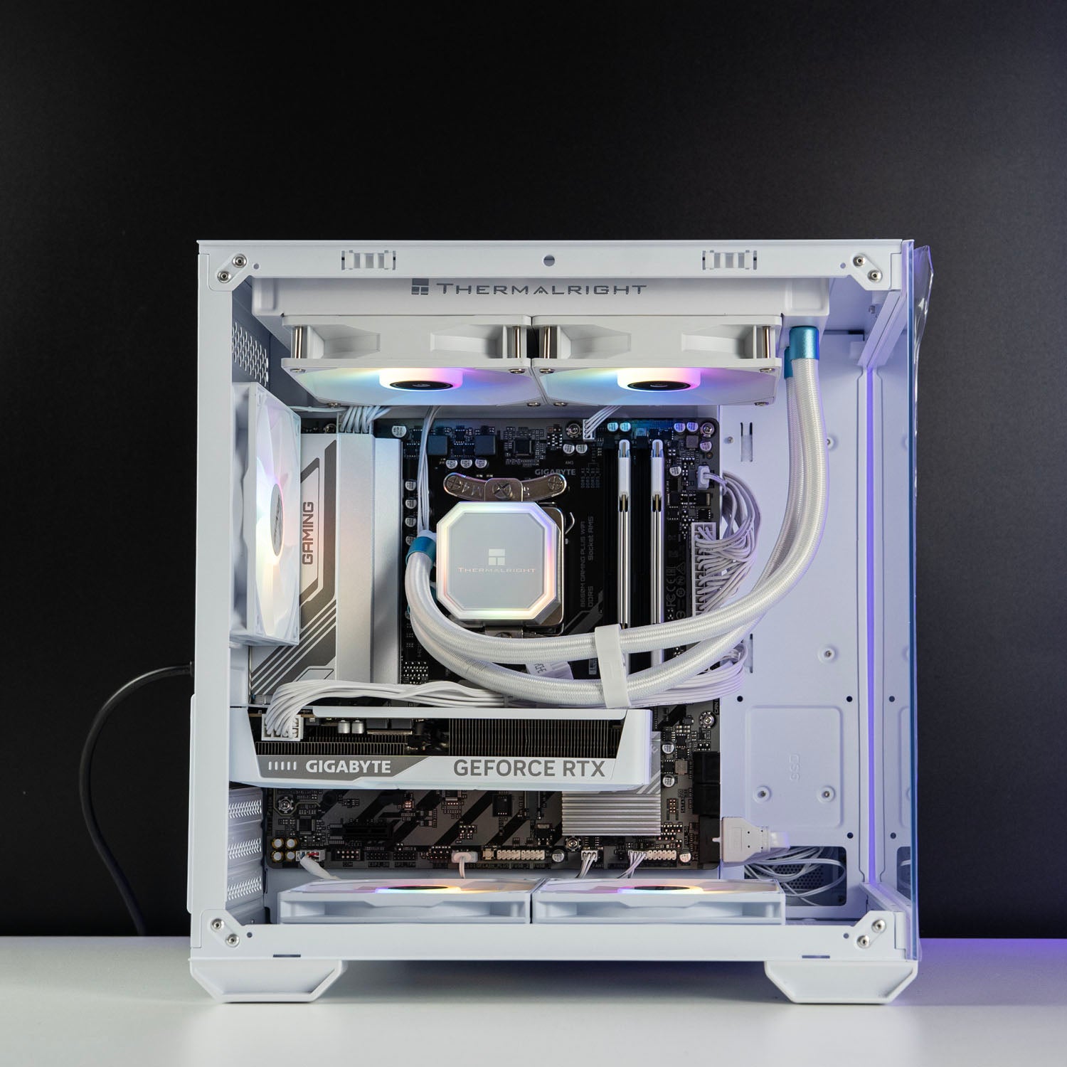 White AMD custom gaming PC with RGB lighting – Ryzen 5 7500F with NVIDIA RTX 5060 8GB, 32GB DDR5, 1TB SSD in Okinos Mirage 4 case, designed for smooth 1080p and 1440p gaming in Australia.