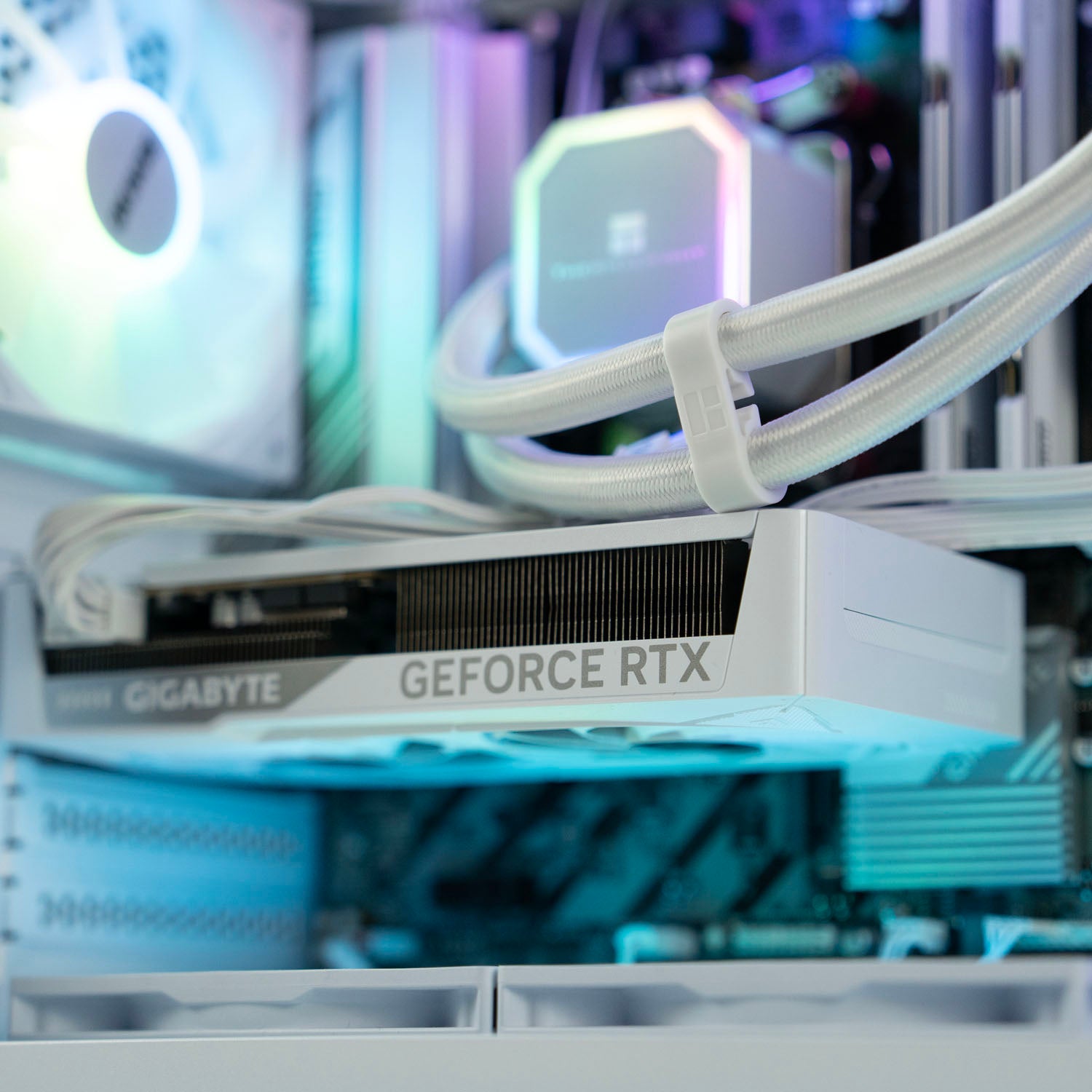 White AMD custom gaming PC with RGB lighting – Ryzen 5 7500F with NVIDIA RTX 5060 8GB, 32GB DDR5, 1TB SSD in Okinos Mirage 4 case, designed for smooth 1080p and 1440p gaming in Australia.