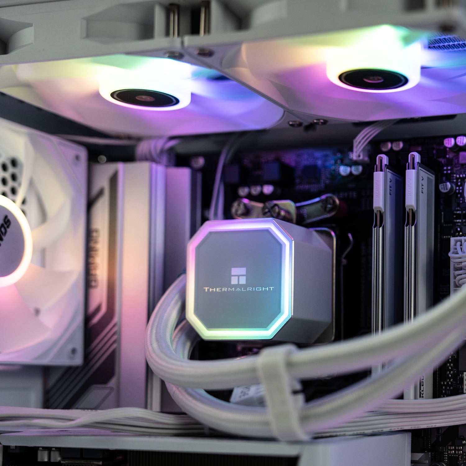 White AMD custom gaming PC with RGB lighting – Ryzen 5 7500F with NVIDIA RTX 5060 8GB, 32GB DDR5, 1TB SSD in Okinos Mirage 4 case, designed for smooth 1080p and 1440p gaming in Australia.