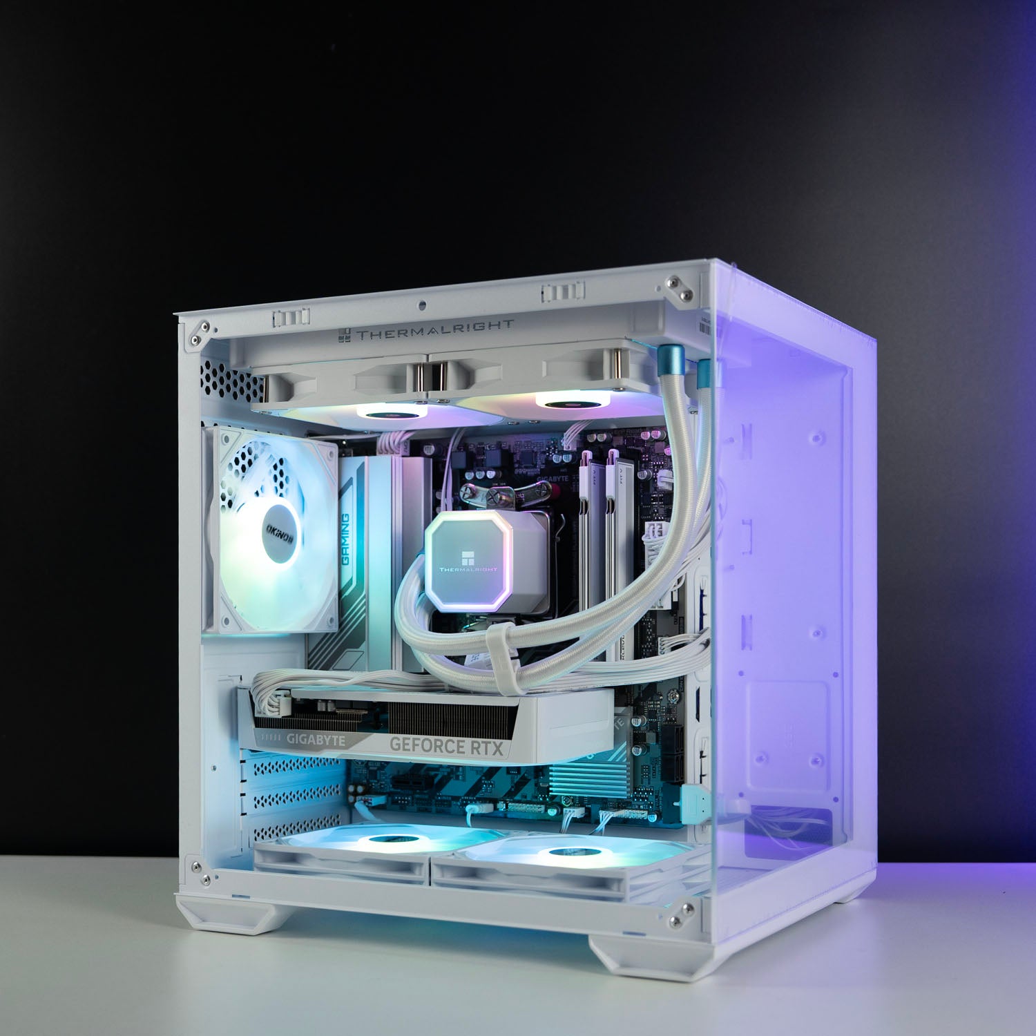 White AMD custom gaming PC with RGB lighting – Ryzen 5 7500F with NVIDIA RTX 5060 8GB, 32GB DDR5, 1TB SSD in Okinos Mirage 4 case, designed for smooth 1080p and 1440p gaming in Australia.
