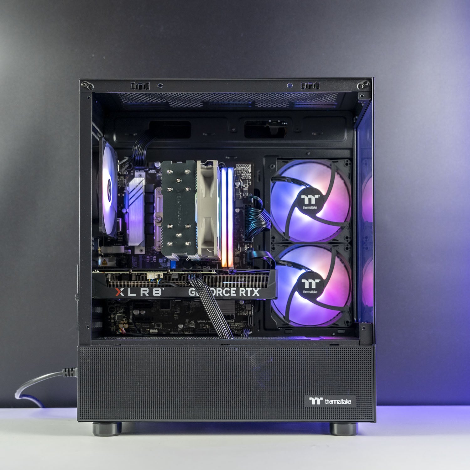Open computer case with visible hardware components, Black AMD custom gaming PC with RGB lighting – Ryzen 7 5700X with NVIDIA RTX 5050 8GB, 32GB DDR4, 1TB SSD in Thermaltake View 170 case, designed for smooth 1080p and 1440p gaming in Australia