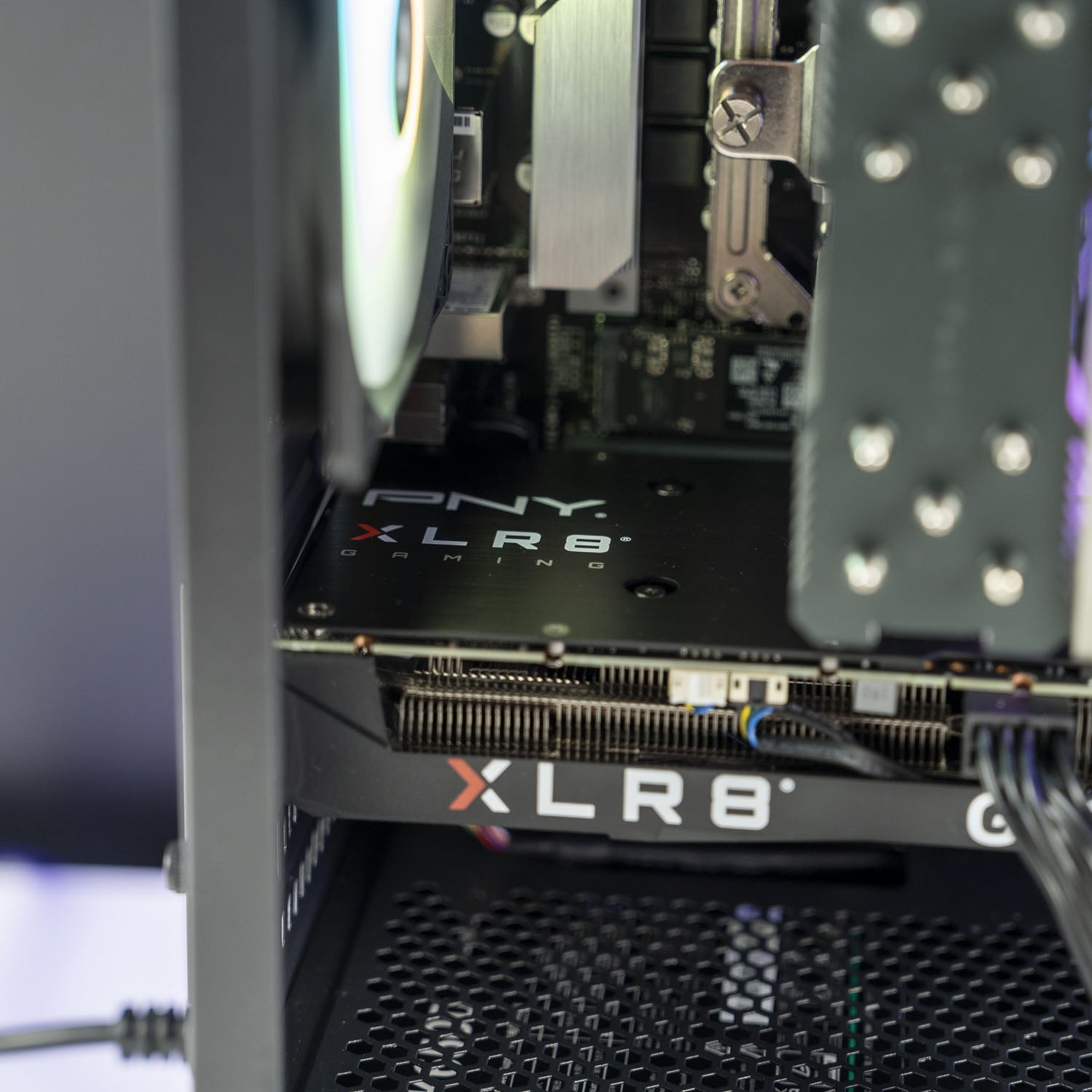 CLOSE UP PHOTO OF Black AMD custom gaming PC with RGB lighting – Ryzen 7 5700X with NVIDIA RTX 5050 8GB, 32GB DDR4, 1TB SSD in Thermaltake View 170 case, designed for smooth 1080p and 1440p gaming in Australia