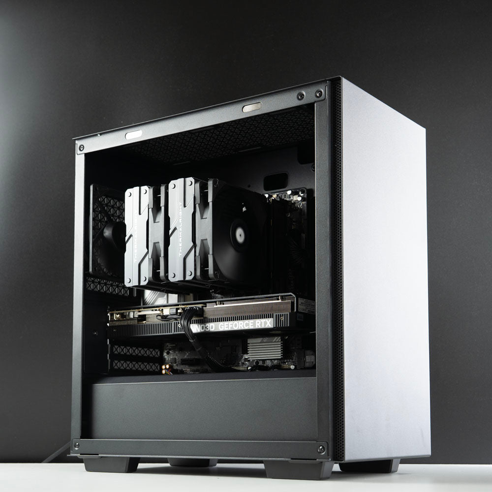 Minimalistic black AMD custom gaming PC – Ryzen 7 7800X3D with NVIDIA RTX 5070 Ti 16GB, 32GB DDR5, 2TB SSD in Deepcool Macube 110 case, designed for smooth 1440p and 4K gaming in Australia with a clean and modern look.