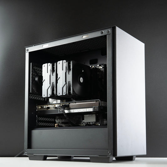 Minimalistic black AMD custom gaming PC – Ryzen 7 7800X3D with NVIDIA RTX 5070 Ti 16GB, 32GB DDR5, 2TB SSD in Deepcool Macube 110 case, designed for smooth 1440p and 4K gaming in Australia with a clean and modern look.
