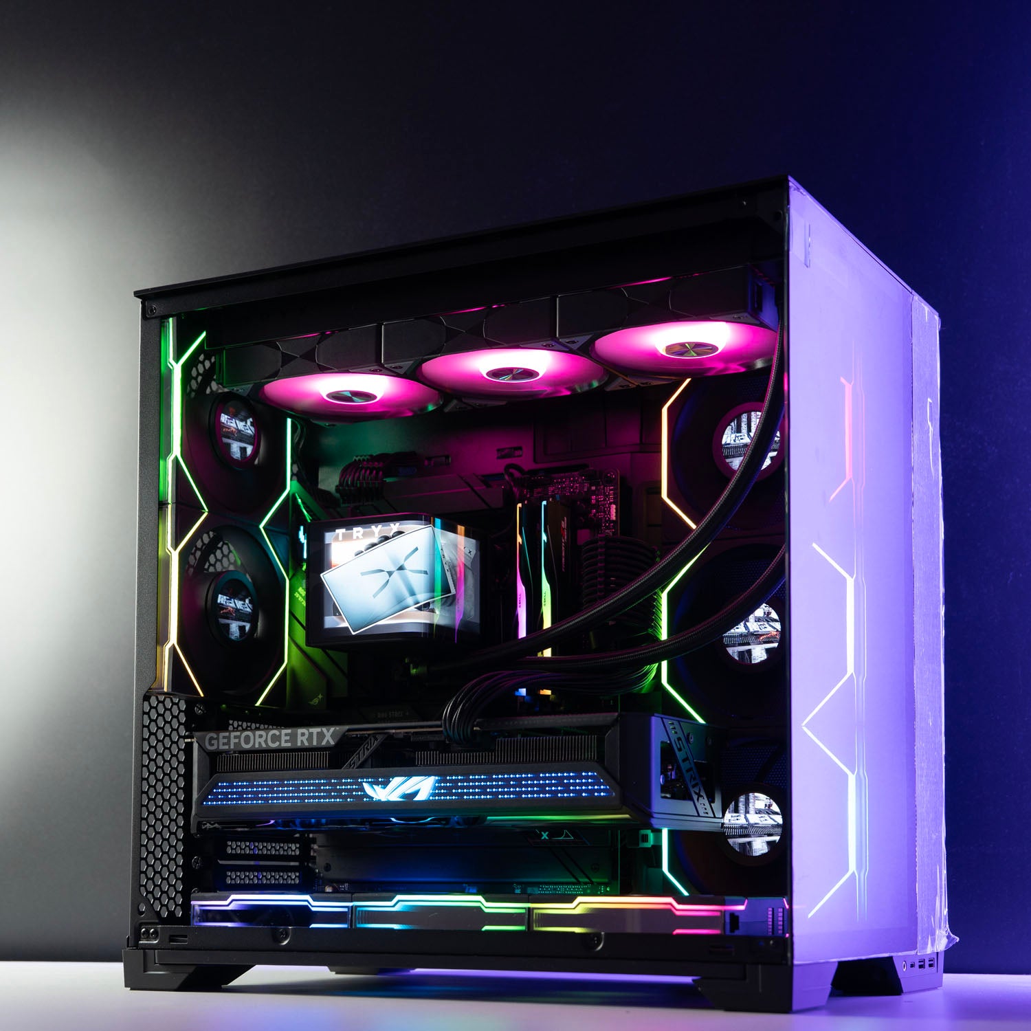 High-end black panoramic AMD gaming PC with RGB lighting – Ryzen 9 9950X3D with ASUS ROG Strix RTX 5070 Ti 16GB, 64GB DDR5, 2TB SSD, TRYX Panorama 360mm liquid cooler, and multiple Lian Li LCD fans in Lian Li O11 Vision Compact case, designed for smooth 1440p/4K gaming and creative workloads in Australia.