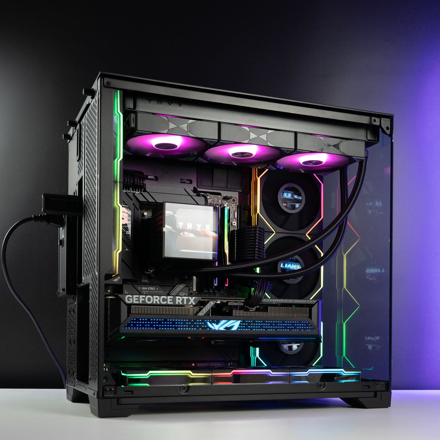 High-end black panoramic AMD gaming PC with RGB lighting – Ryzen 9 9950X3D with ASUS ROG Strix RTX 5070 Ti 16GB, 64GB DDR5, 2TB SSD, TRYX Panorama 360mm liquid cooler, and multiple Lian Li LCD fans in Lian Li O11 Vision Compact case, designed for smooth 1440p/4K gaming and creative workloads in Australia.