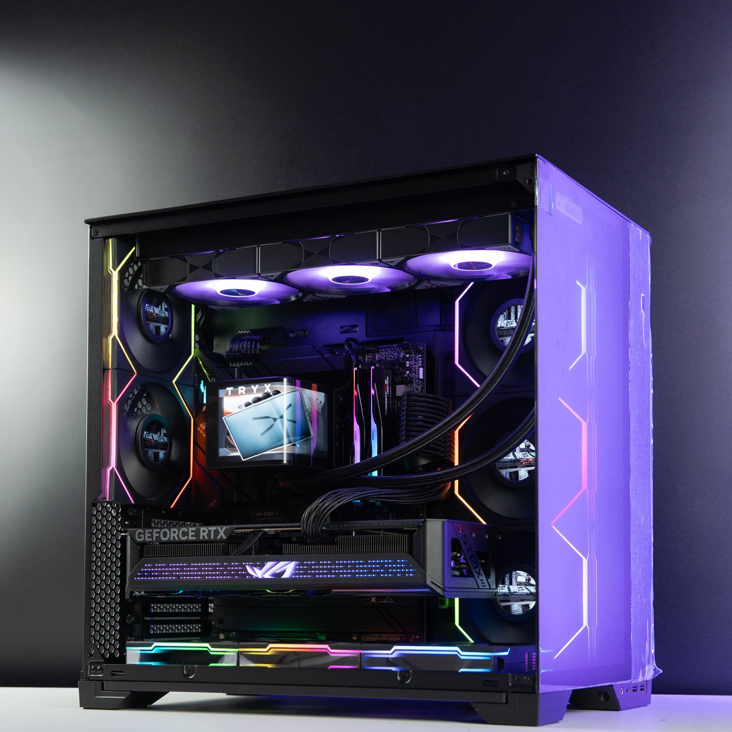 High-end black panoramic AMD gaming PC with RGB lighting – Ryzen 9 9950X3D with ASUS ROG Strix RTX 5070 Ti 16GB, 64GB DDR5, 2TB SSD, TRYX Panorama 360mm liquid cooler, and multiple Lian Li LCD fans in Lian Li O11 Vision Compact case, designed for smooth 1440p/4K gaming and creative workloads in Australia.