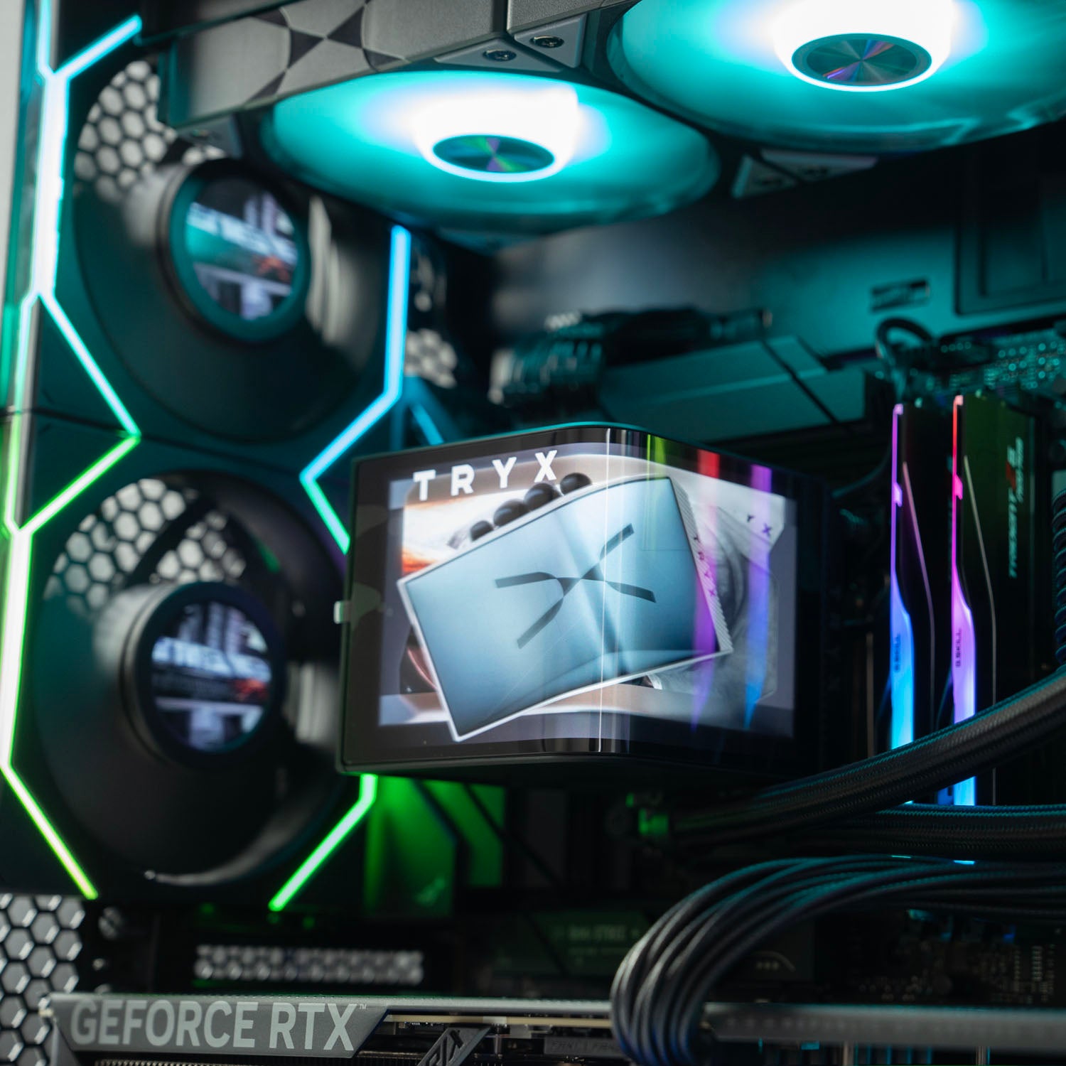 Close-up of a computer motherboard with NVIDIA GeForce RTX graphics card and RGB lighting.High-end black panoramic AMD gaming PC with RGB lighting – Ryzen 9 9950X3D with ASUS ROG Strix RTX 5070 Ti 16GB, 64GB DDR5, 2TB SSD, TRYX Panorama 360mm liquid cooler, and multiple Lian Li LCD fans in Lian Li O11 Vision Compact case, designed for smooth 1440p/4K gaming and creative workloads in Australia.