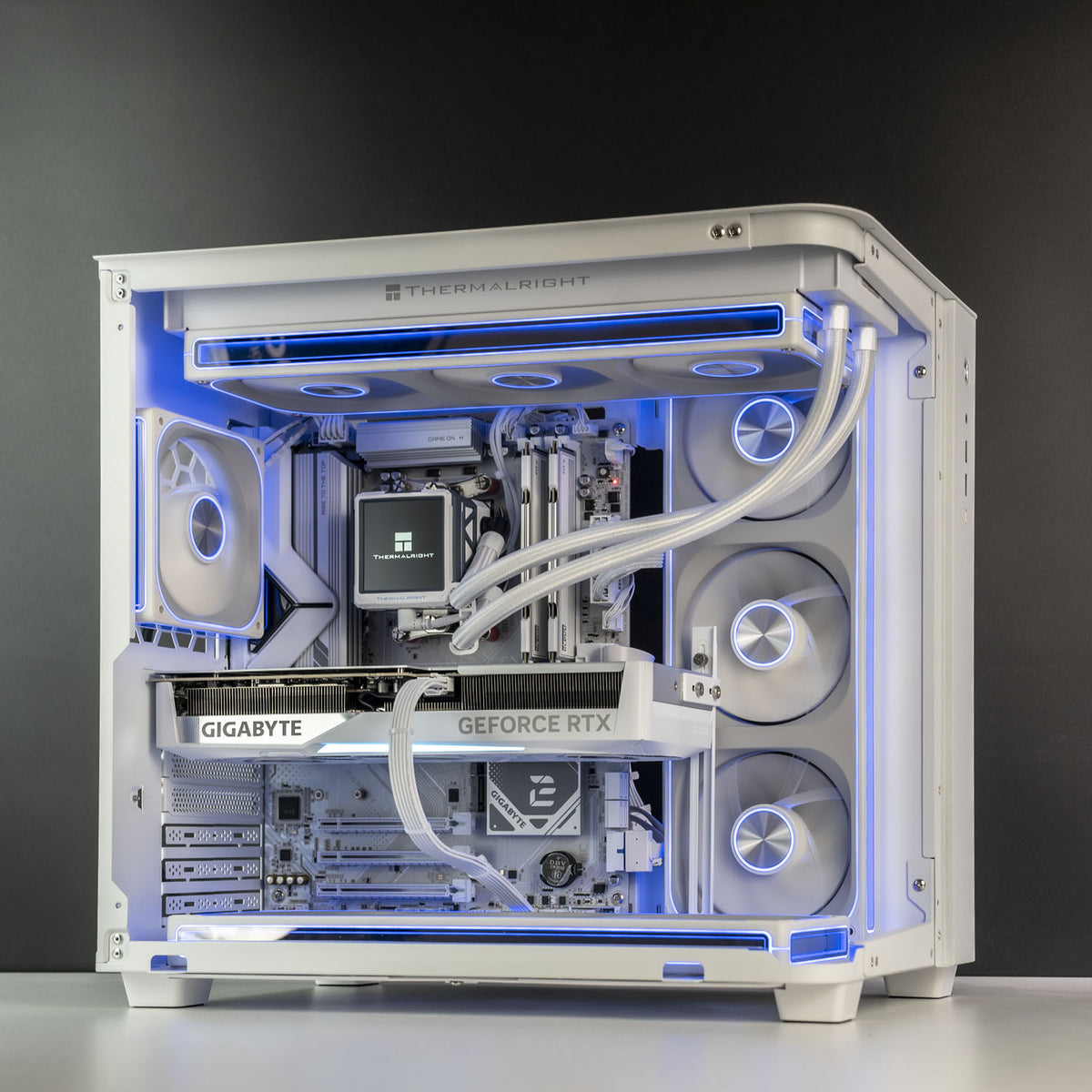 Jonsbo TK-3 case open showing white Gigabyte RTX 5070 Ti 16GB installed
