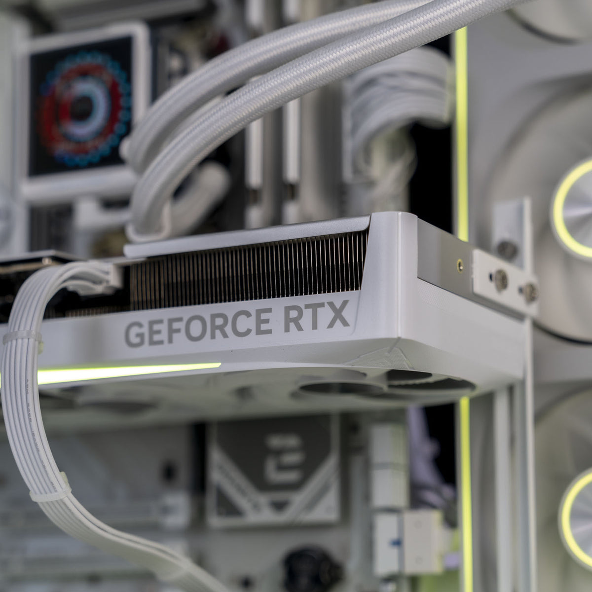 Jonsbo TK-3 case open showing white Gigabyte RTX 5070 Ti 16GB installed