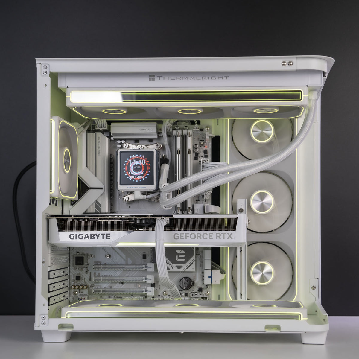 Jonsbo TK-3 case open showing white Gigabyte RTX 5070 Ti 16GB installed