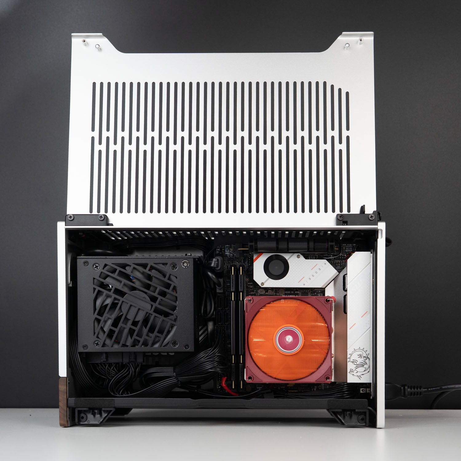 Full internal build — MSI B650I Edge WIFI motherboard, cable management in Fractal Terra case
