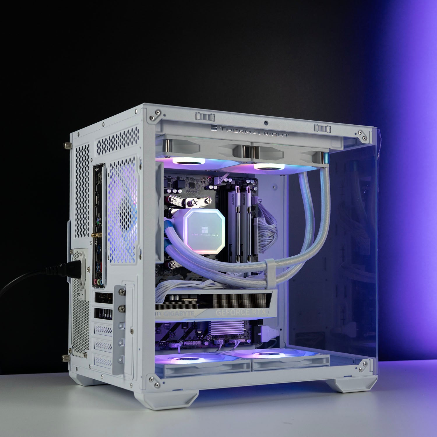 White AMD custom gaming PC with RGB lighting – Ryzen 5 7500F with NVIDIA RTX 5060 8GB, 32GB DDR5, 1TB SSD in Okinos Mirage 4 case, designed for smooth 1080p and 1440p gaming in Australia.
