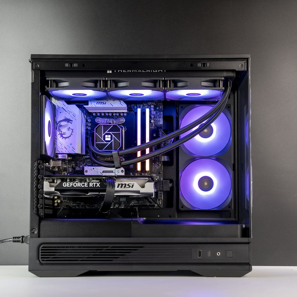 Antec C2M case open showing MSI RTX 5060 Ti 16GB installed