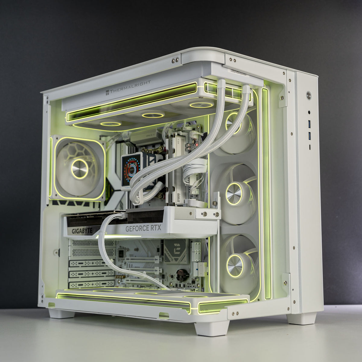 Jonsbo TK-3 case open showing white Gigabyte RTX 5070 Ti 16GB installed